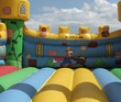 Bouncy castle interior against cloudy sky