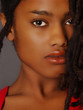 Lovely Closeup of beautiful Black woman on grey