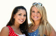 Two smiling girl friends - blond and brunette