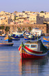 Colorful, traditional fishing boats at Marsaxlokk Village,Malta
