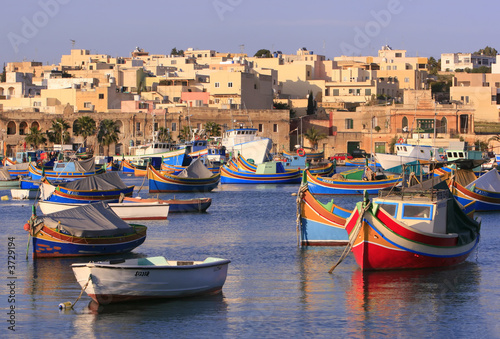 Colorful, traditional fishing boats at Marsaxlokk Village,Malta