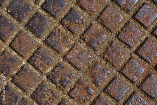 Photo: Rusty metal checker. Rusty metal checker.
