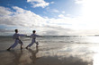 Young adult men with black belt practicing a Kata 