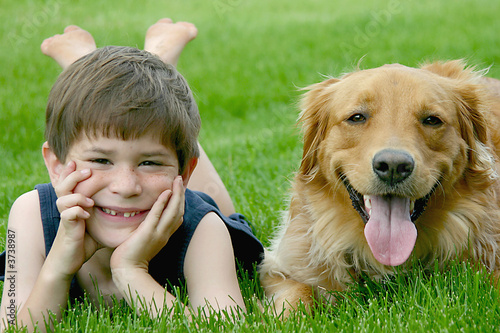 Photo: Young Boy With Dog Young Boy With Dog
