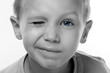 Photo: a boy with blue eyes is blinking a boy with blue eyes is blinking