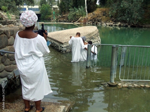 People baptizing in Jordan River/Holy Land/Israel People baptizing in Jordan River/Holy Land/Israel
