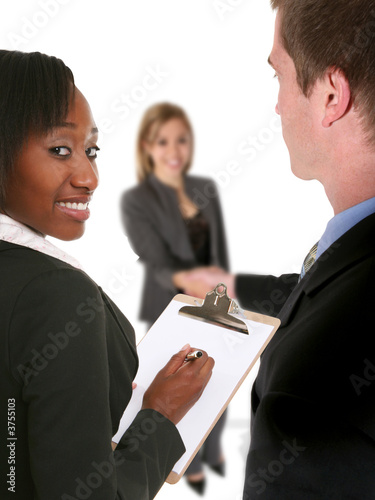 Photo: A business team conducting an interview with a job seeker A business team conducting an interview with a job seeker
