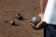 Man playing jeu de boules in France