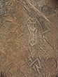 Carving on Edakkal Cave’s walls by stone age men.