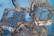 Melting ice cubes closeup on blue background (b3) Melting ice cubes closeup on blue background (b3)