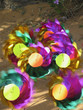 Colorful spinning wheels offend in the soil. 
