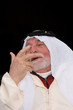 older middle-eastern man with white beard, 