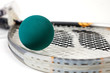Close up shot of racquetball gear on a white background.