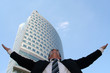 Businessman with his arms wide open