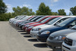 Photo: New fuel efficient SUV's on a car dealers lot for sale. New fuel efficient SUV's on a car dealers lot for sale.