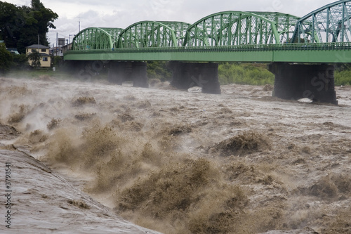 Raging waters of the Fuji River during a Typhoon Raging waters of the Fuji River during a Typhoon