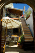 Colorful, narrow greek restaurant in Lindos Colorful, narrow greek restaurant in Lindos