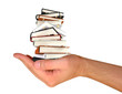 books in the hand isolated on white