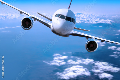 Airplane above the clouds,
