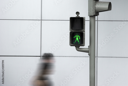 Photo: People crossing the road in motion efect People crossing the road in motion efect