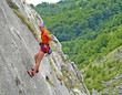 Young climber saying hello to the camera
