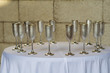 Champagne glasses on a round white table