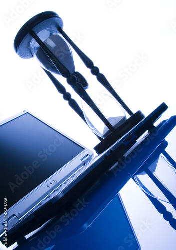Photo: laptop & timer laptop & timer