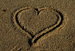Hand drawn heart on the sand detail