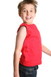 Happy smiling boy jumping into the air-  side view