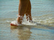 barefoot in the surf
