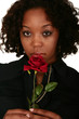 African American Girl Smelling Rose