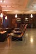 Hotel lobby with neat furniture and lighting