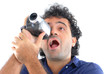 Man holding a camcorder and making a movie.