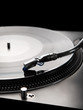 Macro shot of vinyl player with backlight Macro shot of vinyl player with backlight