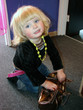 Playing with mom's handbag