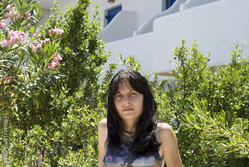 Photo: greek island cyclades architecture with pretty woman greek island cyclades architecture with pretty woman