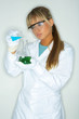 Beautiful female lab worker testing and experimenting