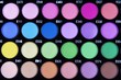 A make-up multi colored palette close up.