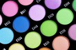 A make-up multi colored palette close up.