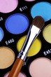 A make-up multi colored palette close up.
