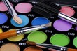 A make-up multi colored palette close up.