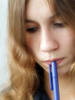 Girl with a pen thinking over some idea. Soft focus