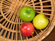 Apples on wicker plate
