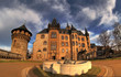 old castle in harz against blue sky and white clouds old castle in harz against blue sky and white clouds