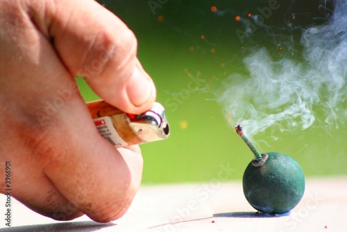 Photo: Lighting a Firework Lighting a Firework