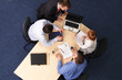 brainstorming at the four people business meeting