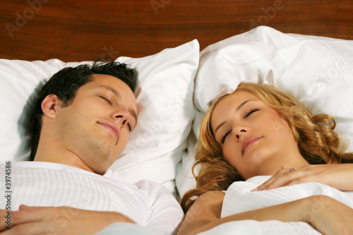 Photo: sleeping young couple sleeping young couple