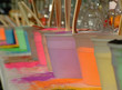 Multicolored table of sand for kids at the fair