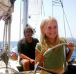 father and daughter are sailing