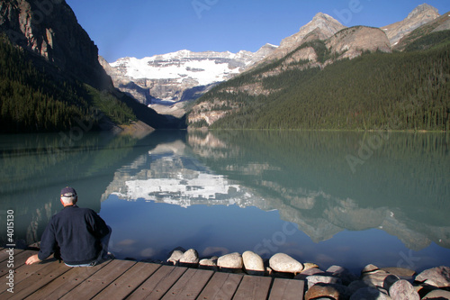 Lake Louise with Man sitting on a dock